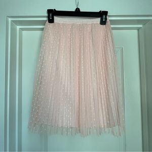 Pink tulle polka dot skirt.